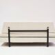 Italian modernist daybed with white upholstery and iron frame.