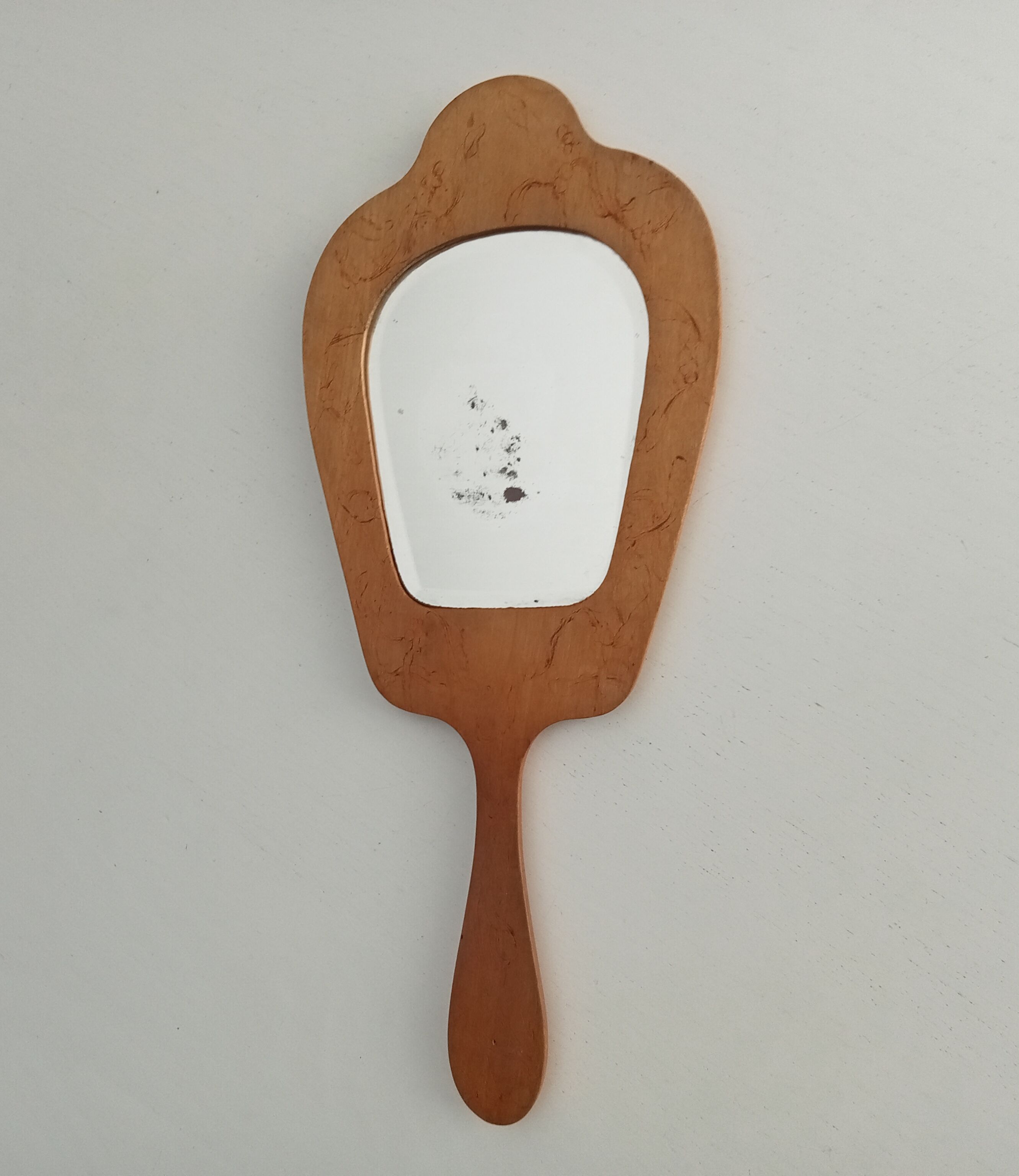 Antique beveled hand mirror