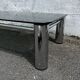 Vintage coffee table with smoked glass and chrome.