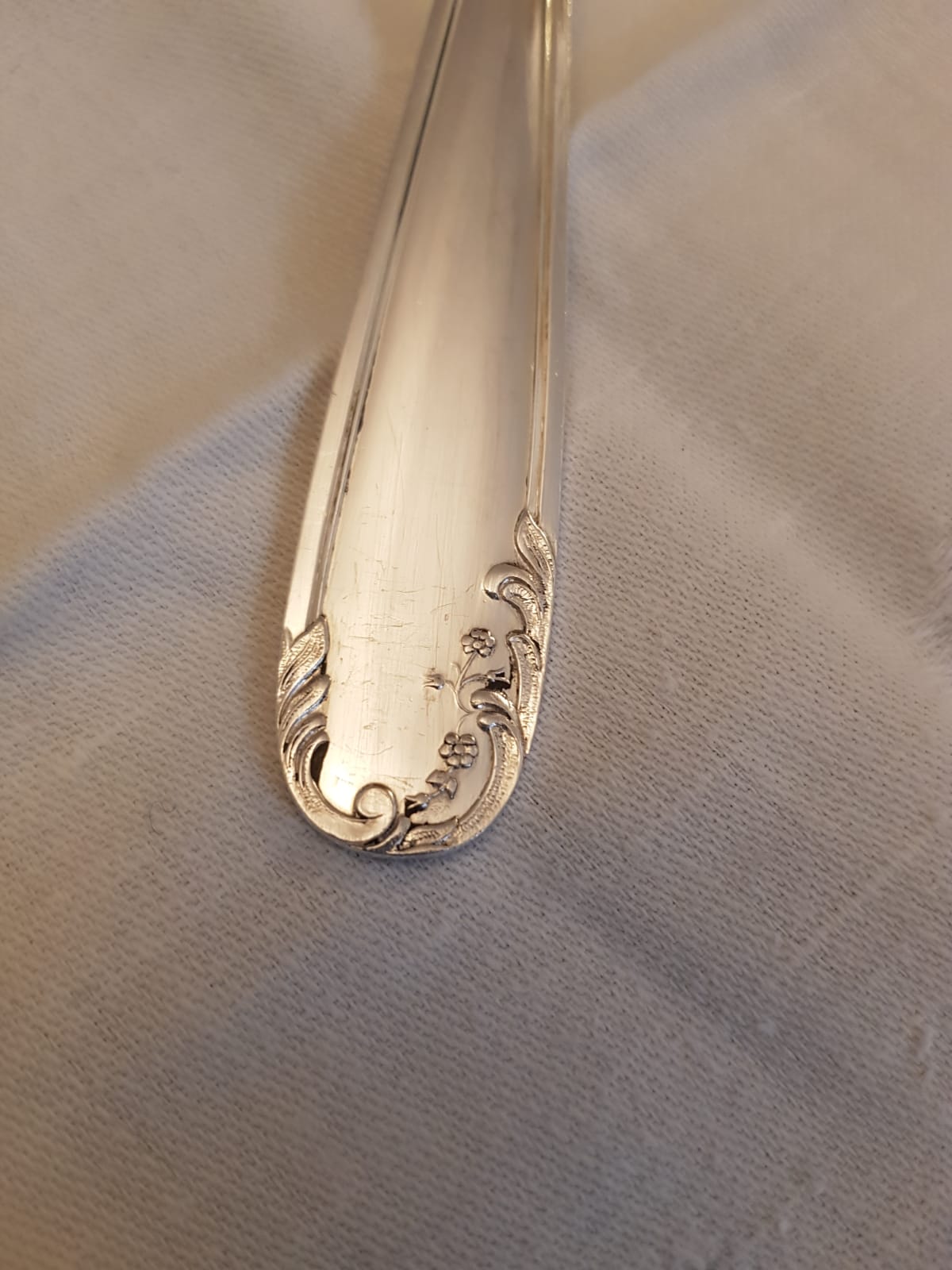 Silver cutlery set with 36 place settings and ladle