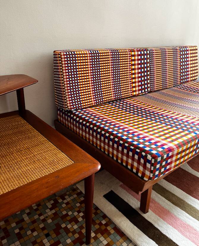 Peter Hvidt Knoll wooden banquette sofa with new cushions.