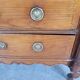 Small 18th-century chest of drawers in walnut and cherry wood.