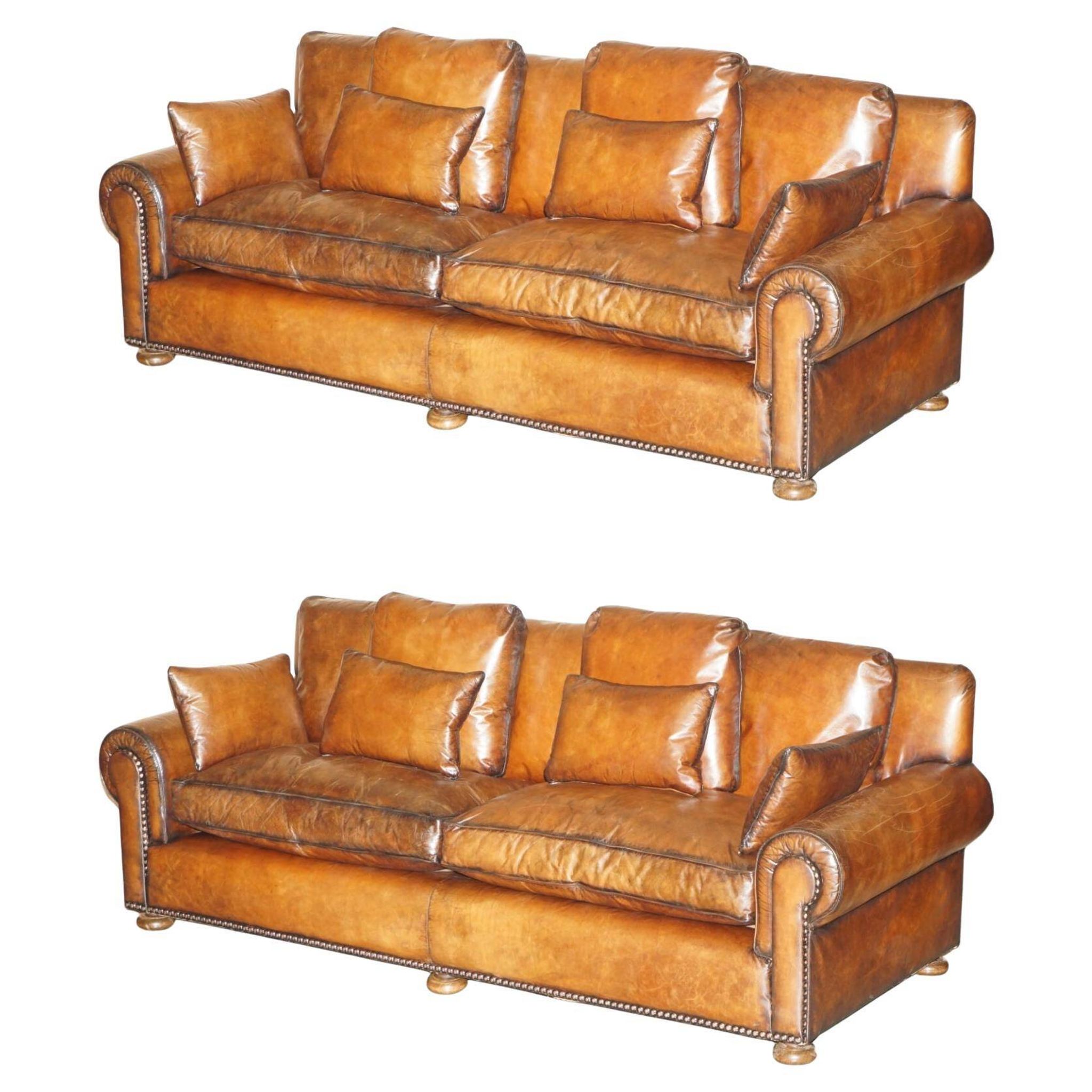 Pair of Ralph Lauren Jamaica club sofas restored in leather.
