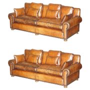 Pair of Ralph Lauren Jamaica club sofas restored in leather.