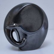 Two iridescent black and white ceramic elephants design