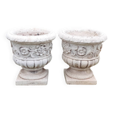 Pair of Medici planters with floral decoration