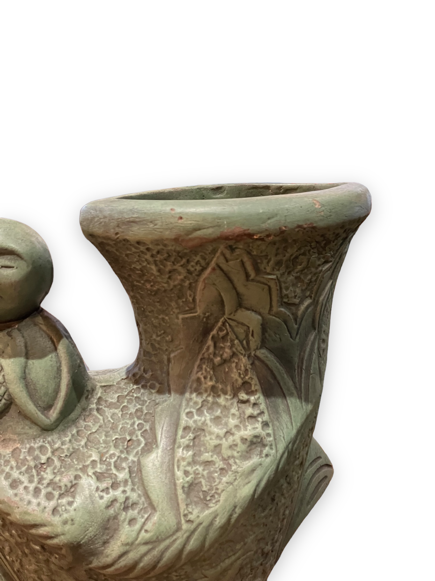 Ethnic anthropomorphic vase in patinated terracotta