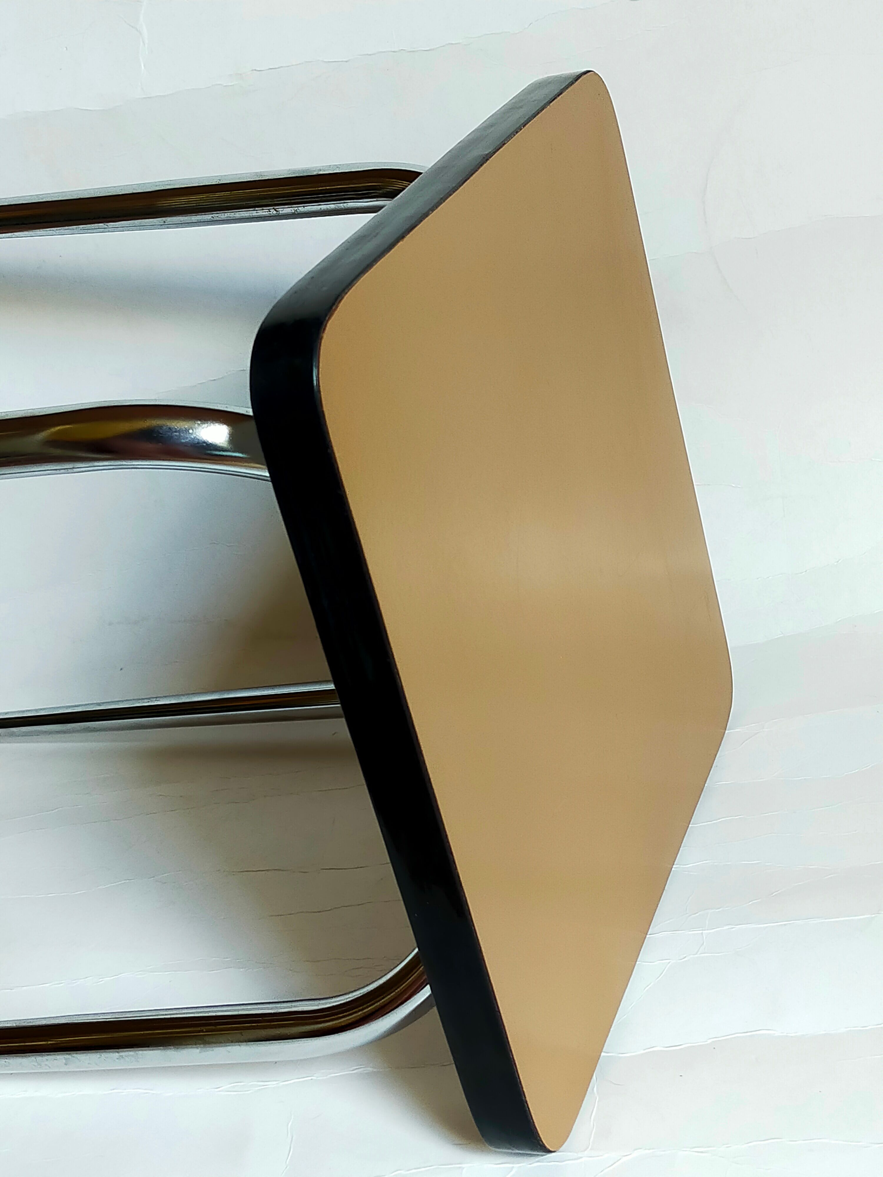 Vintage formica stool with tapered feet