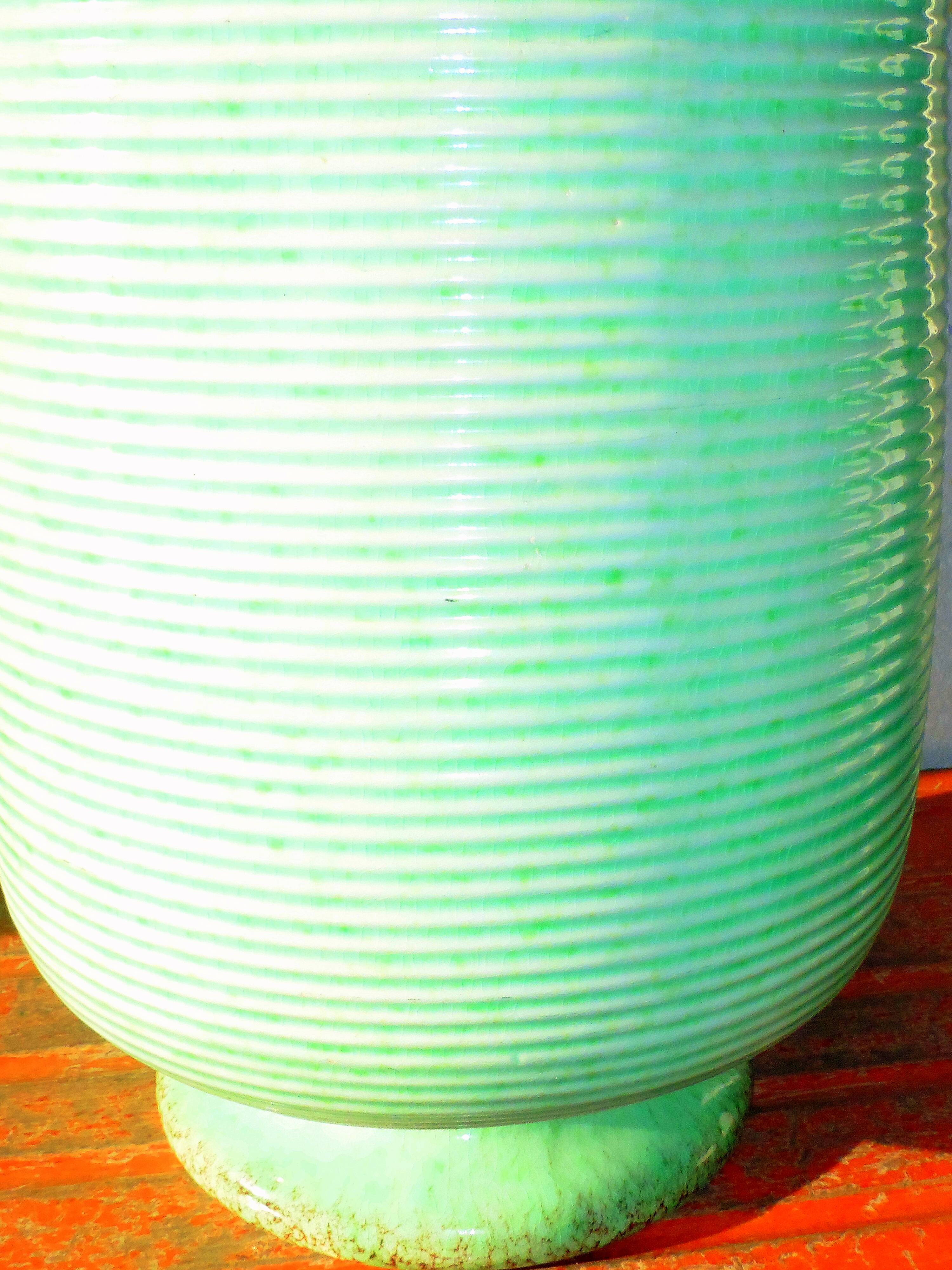 Enamelled earthenware vase with striated pattern