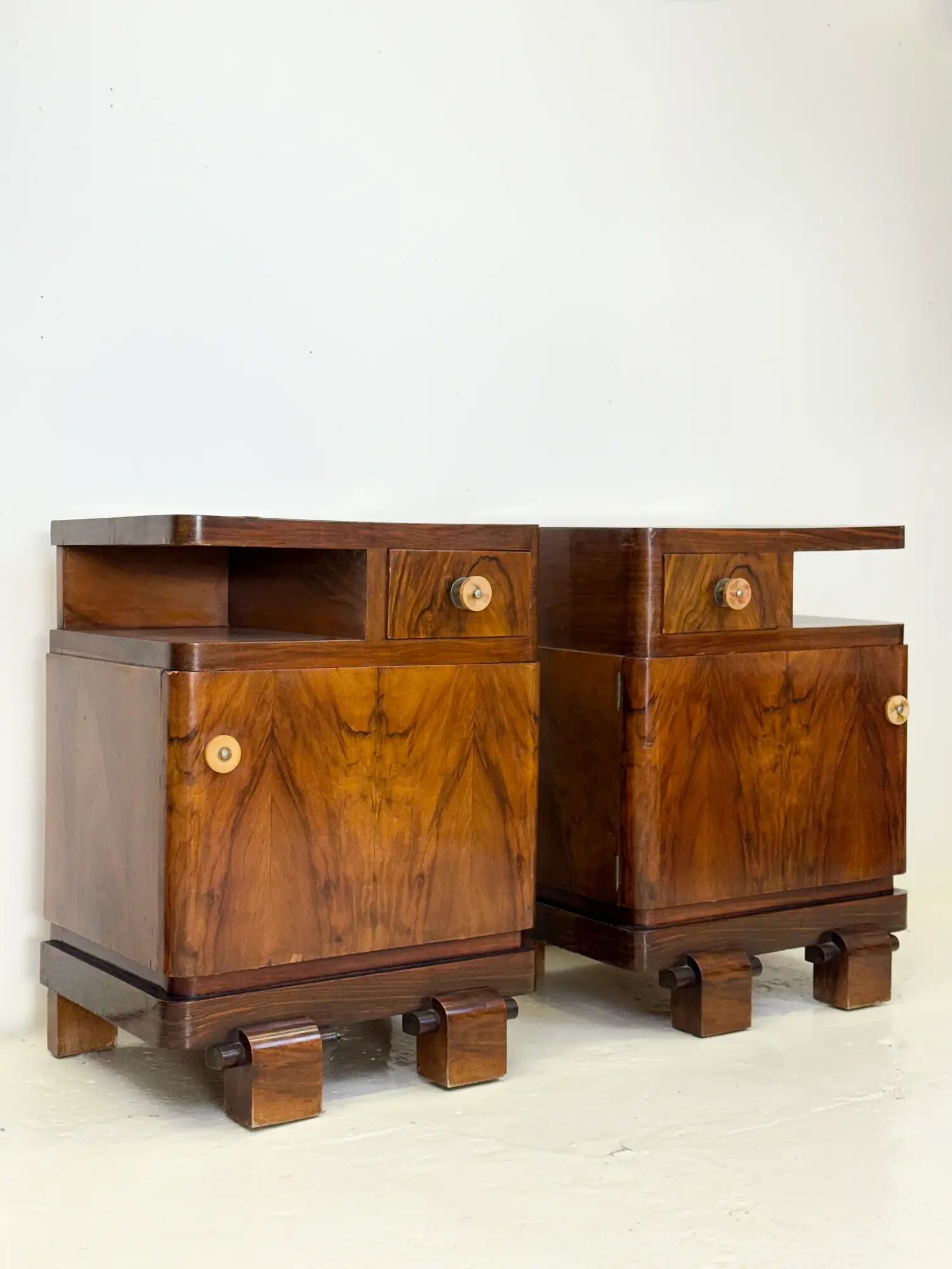 Pair of Art Deco bedside tables in walnut — Italy, 1930-1940
