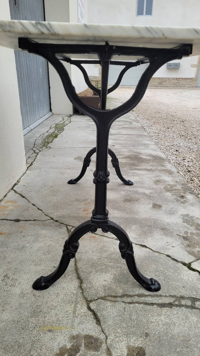 Marble and cast iron restaurant bistro table