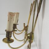 Pair of bronze crossed arrow wall lights Lucien Gau