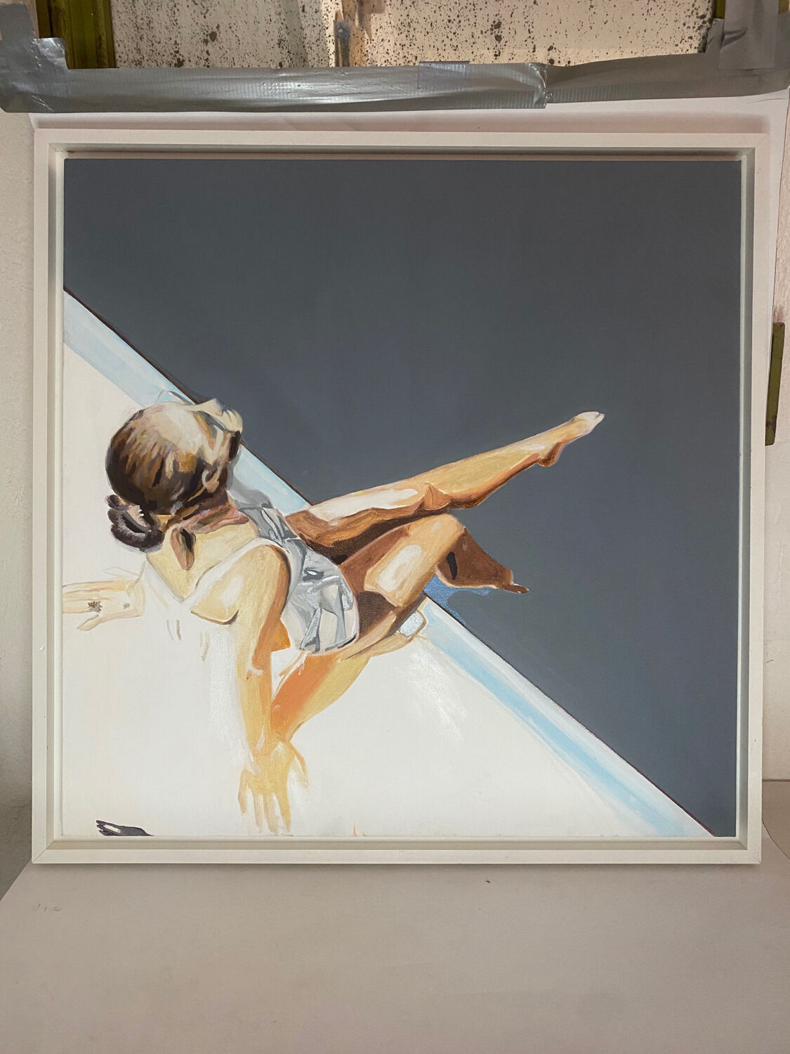Seated woman painting