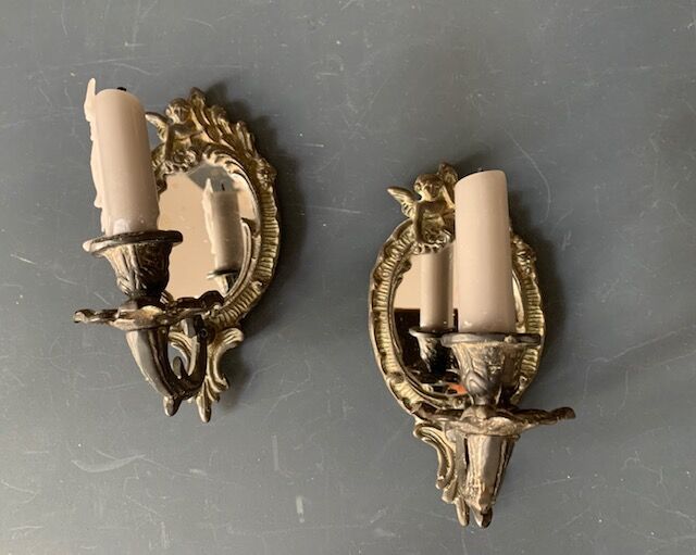 Pair of antique bronze candle holders