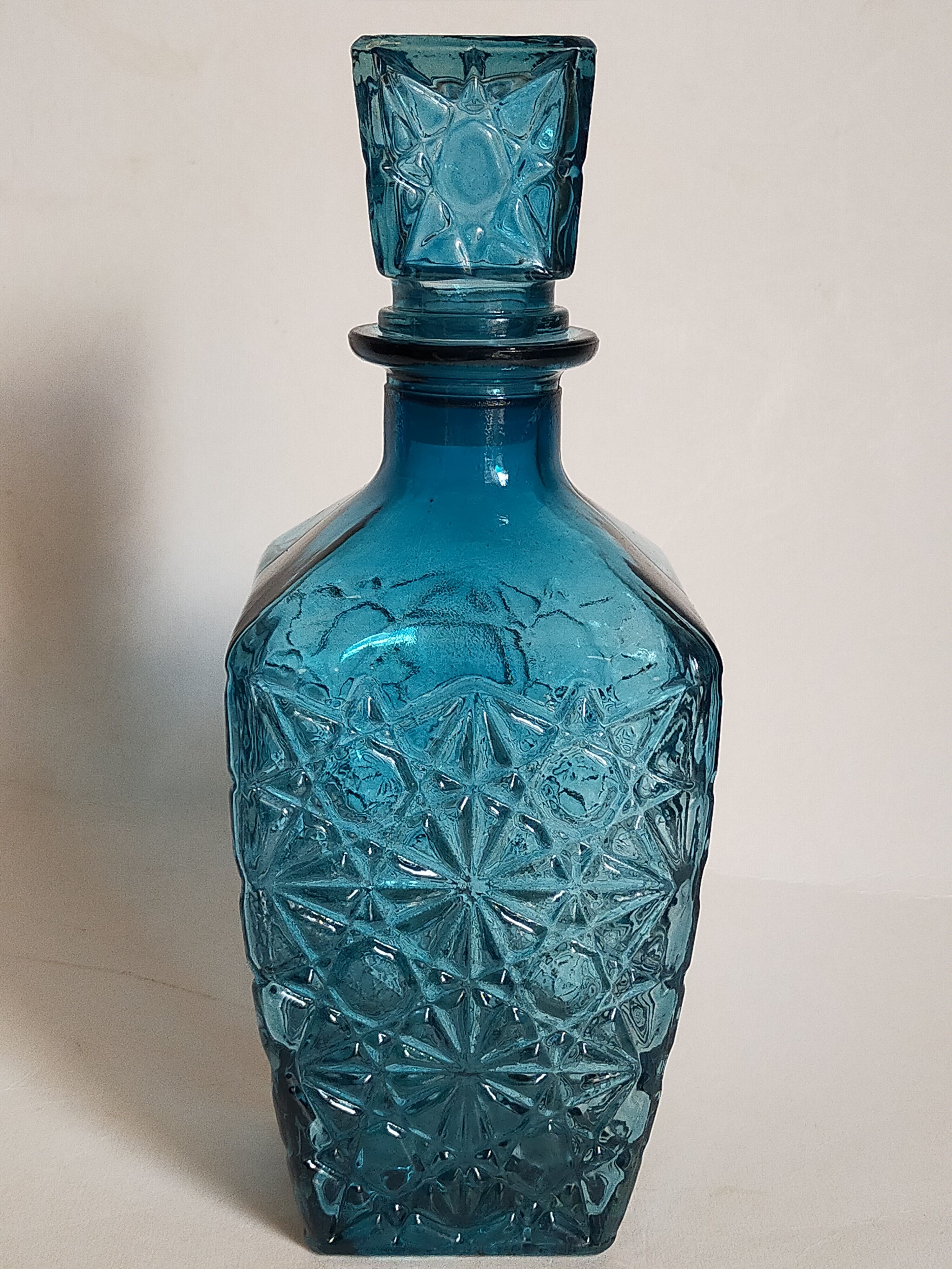 Vintage blue glass whiskey decanter