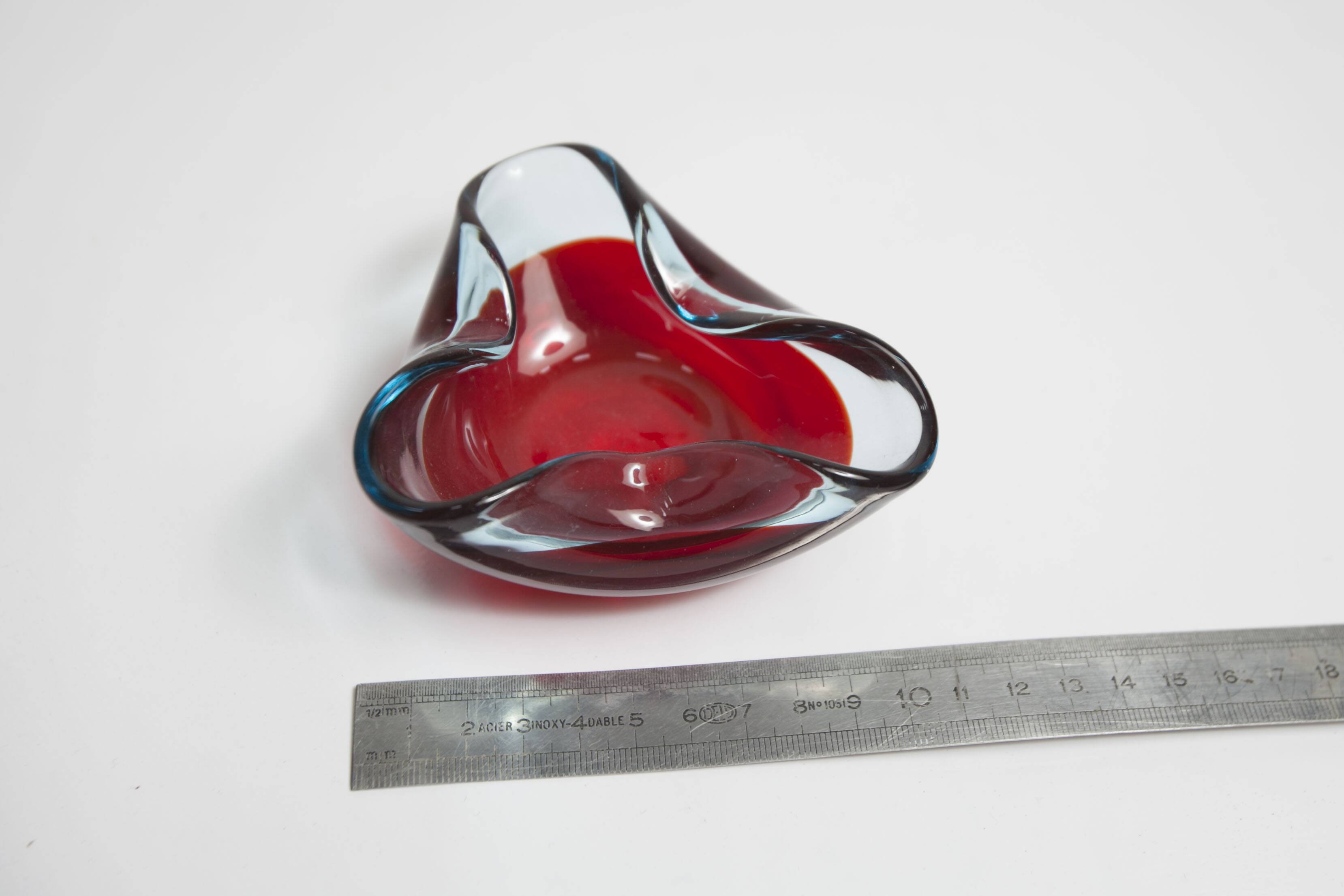 Asymmetrical ashtray murano red and transparent background 1960