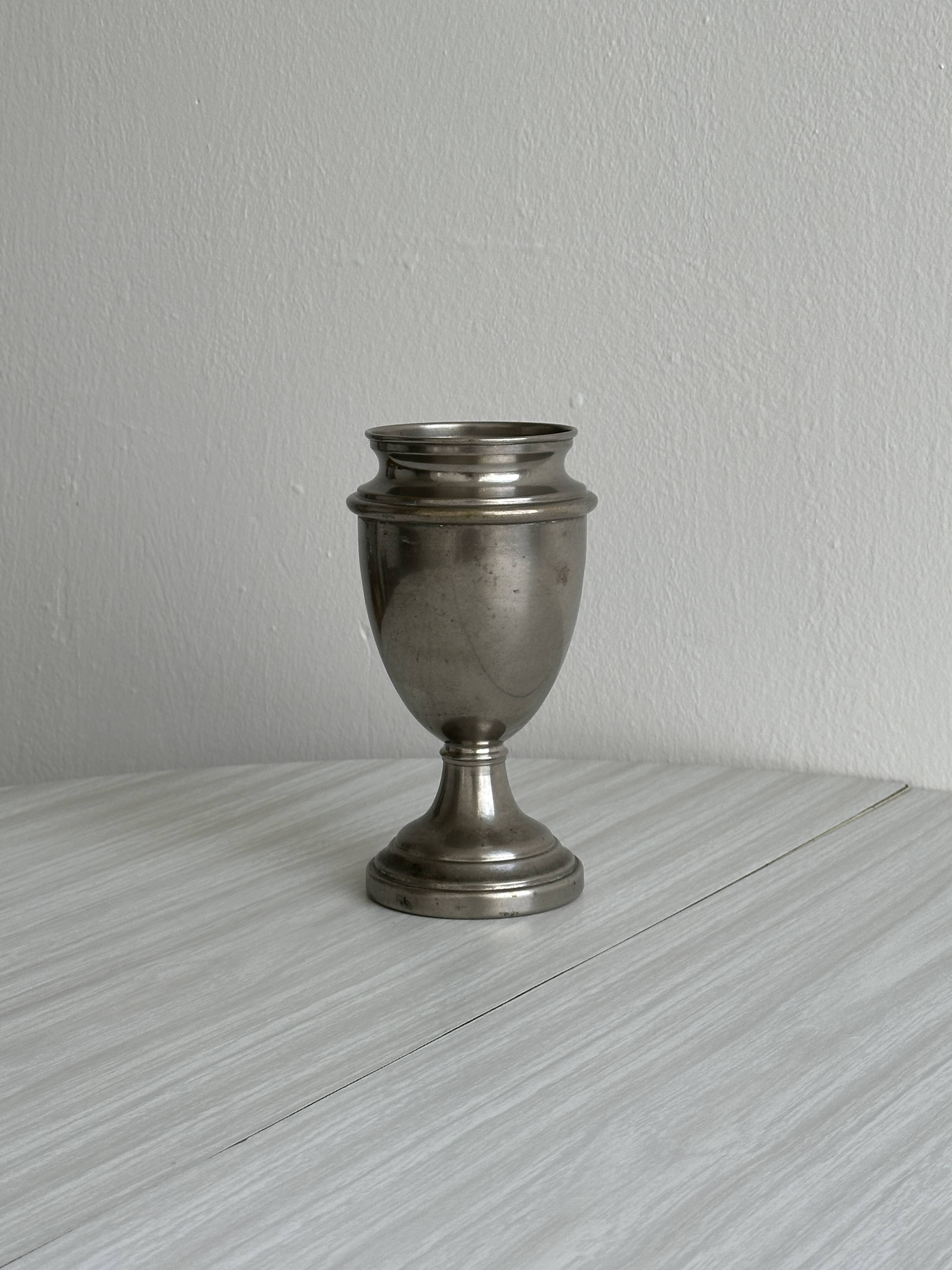 Vintage patinated tin vase