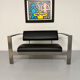 Brutalist living room with faux metal armchairs designed by Karl Friedrich Forster