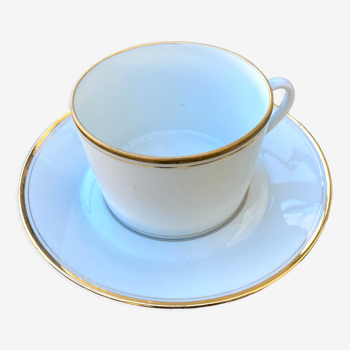 Tasse et sous tasse blanche en porcelaine à liseret doré
