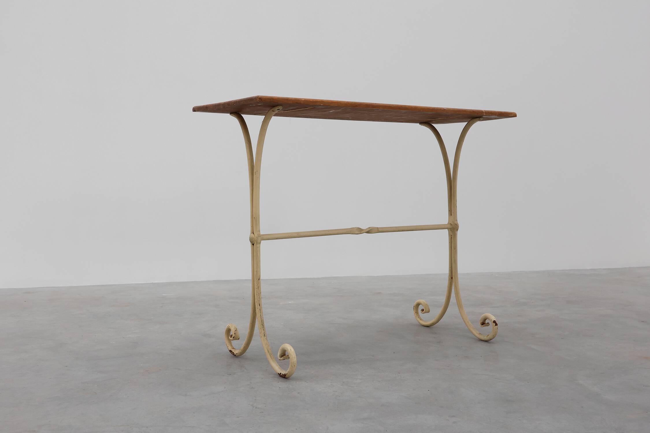 20th century French bistro table with cast iron base and oak top