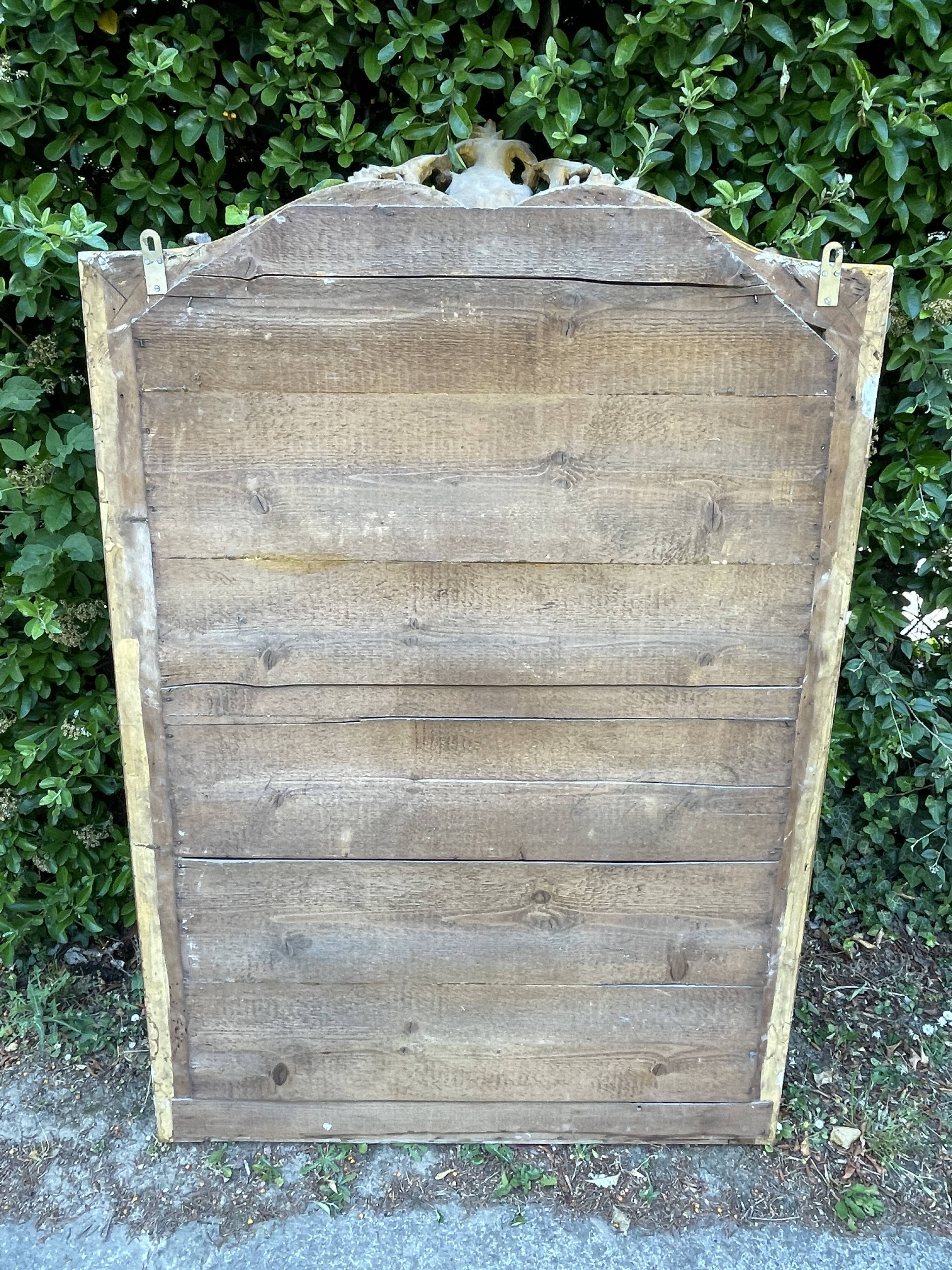 Old Louis XV style mirror in wood and gilded stucco. Napoleon III