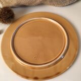 Yellow trivet with ceramic grid patterns