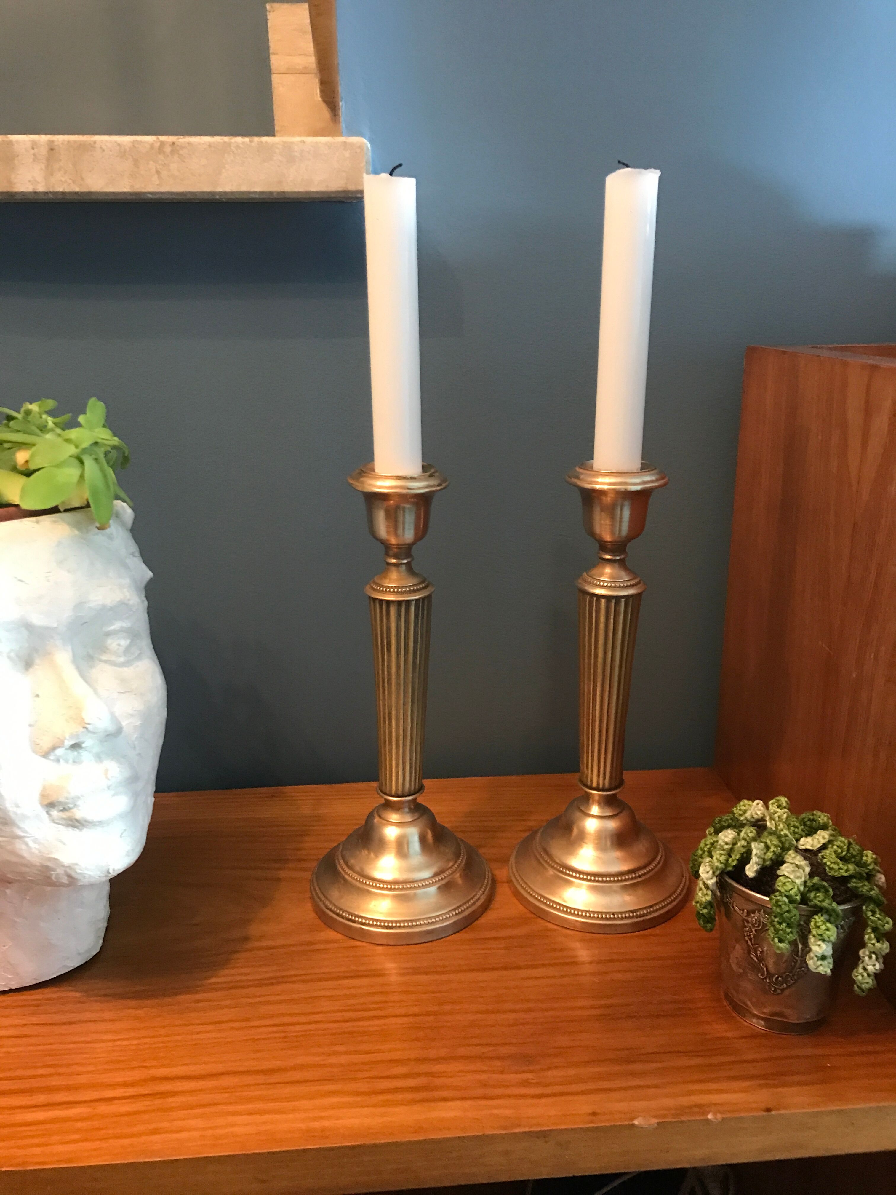Pair of old brass candlesticks