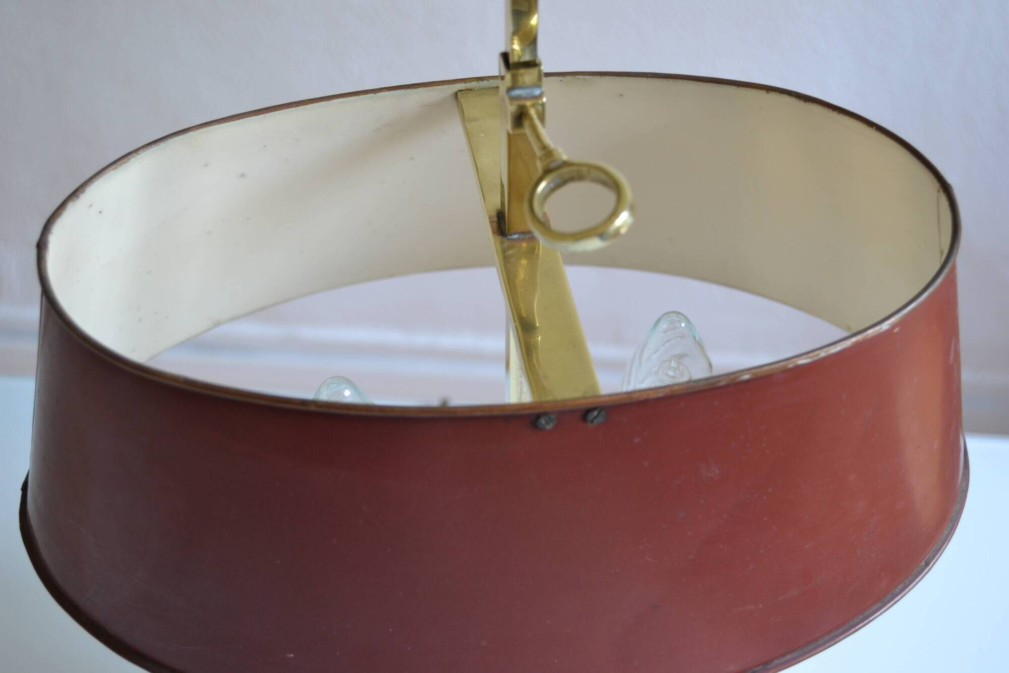 hot water bottle lamp with 2 bronze lights and burgundy sheet metal lampshade
