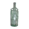 Old transparent moulded glass bottle