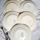 Old flat plates mismatched in earthenware