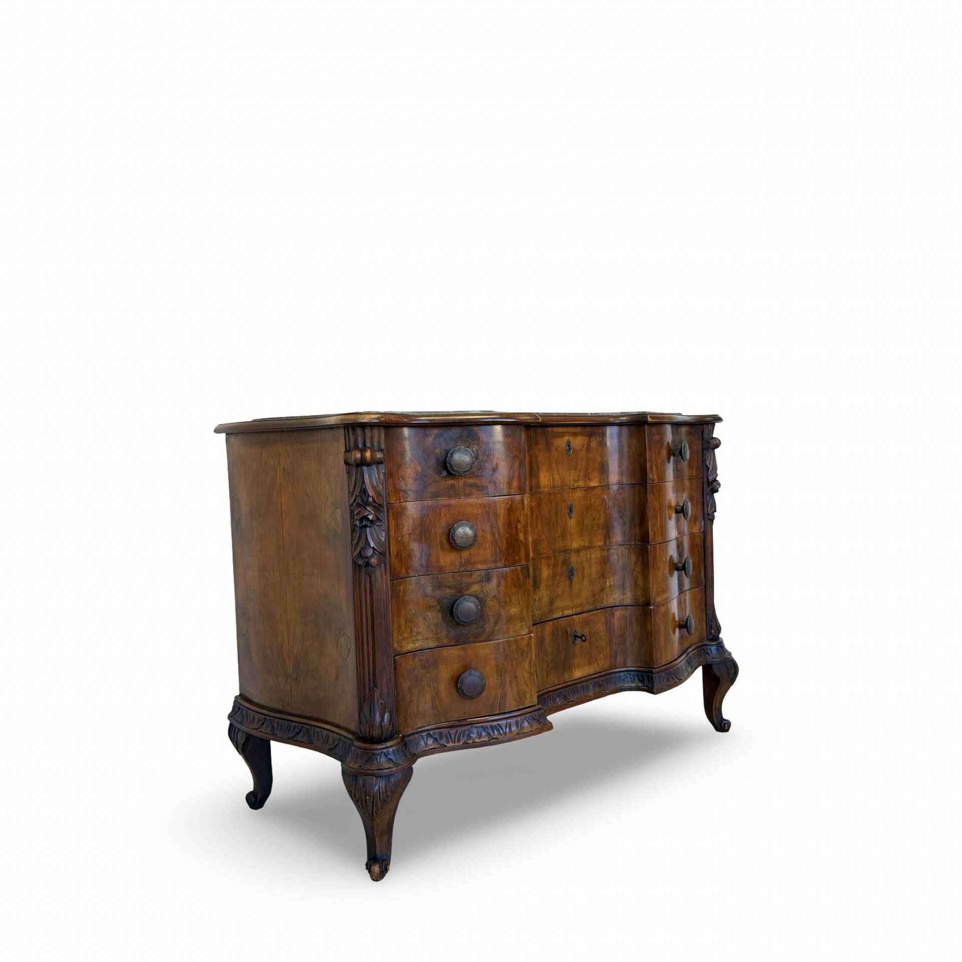 serpentine commode in antique walnut