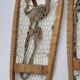 Old snowshoes made of wood and hoses