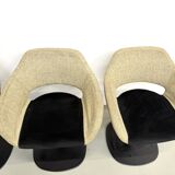 Series of six swivel chairs with an organic shell, patterned fabric and base.