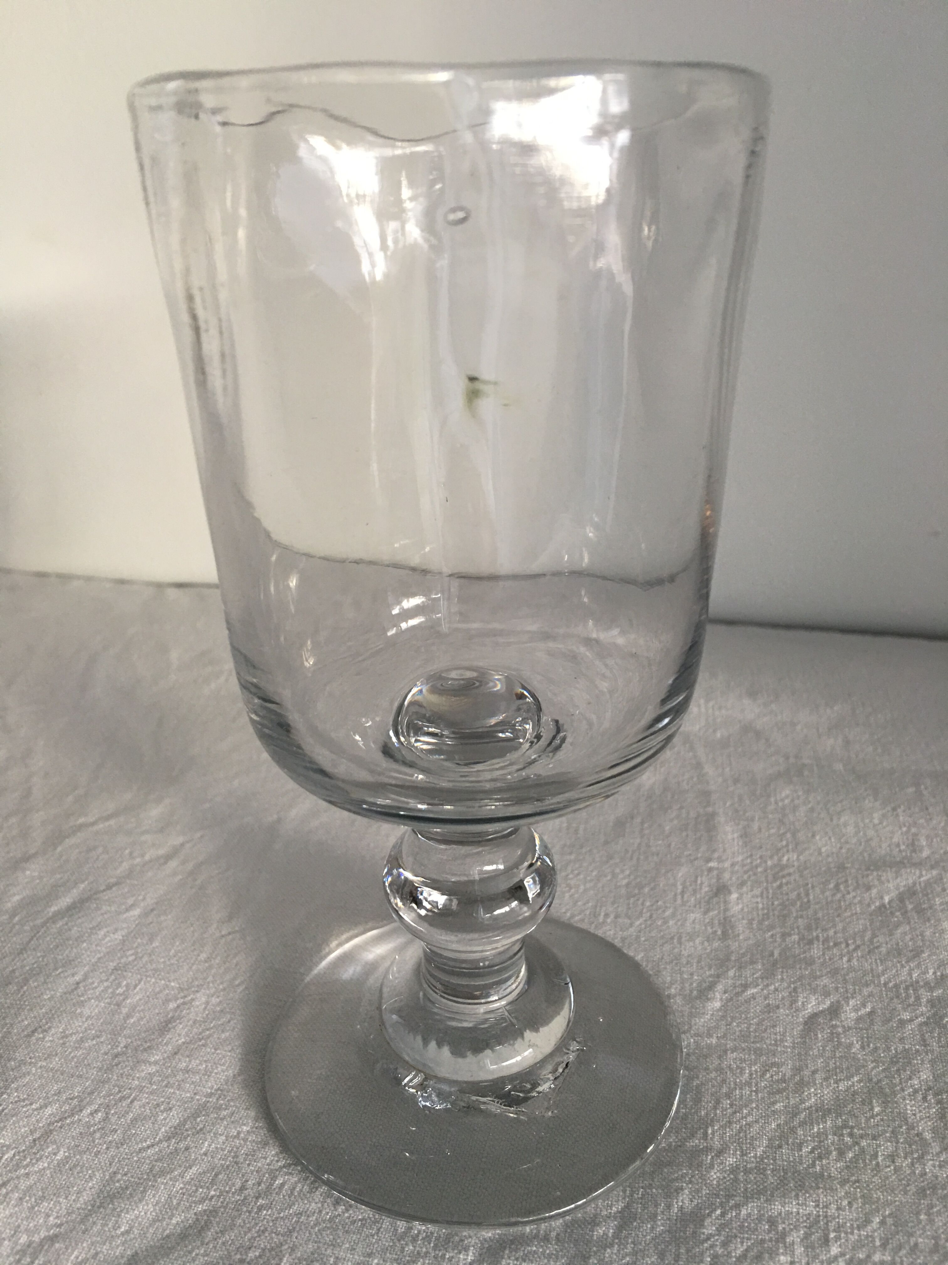 Glass on foot - blown glass bubble late nineteenth early twentieth