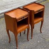 2 Louis XV bedside tables made of curved solid wood with drawers.