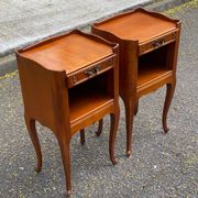 2 Louis XV bedside tables made of curved solid wood with drawers.