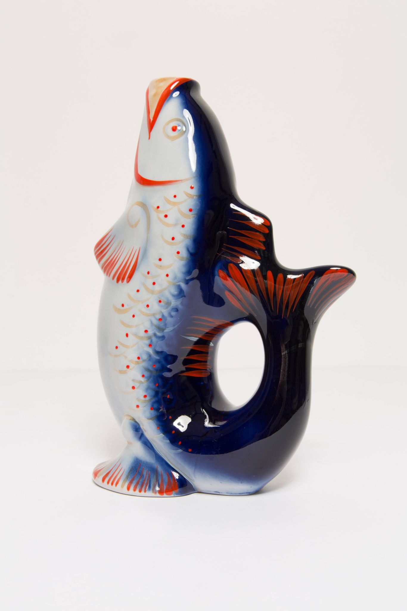 Set of 7 blue glass fish, mid-20th century.