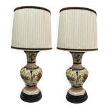 A pair of lamps with a pleated couture lampshade in wild silk
