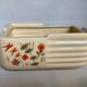 Art Deco planter with stencilled flower motif