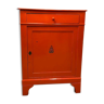 Old wooden cabinet in orange, high model