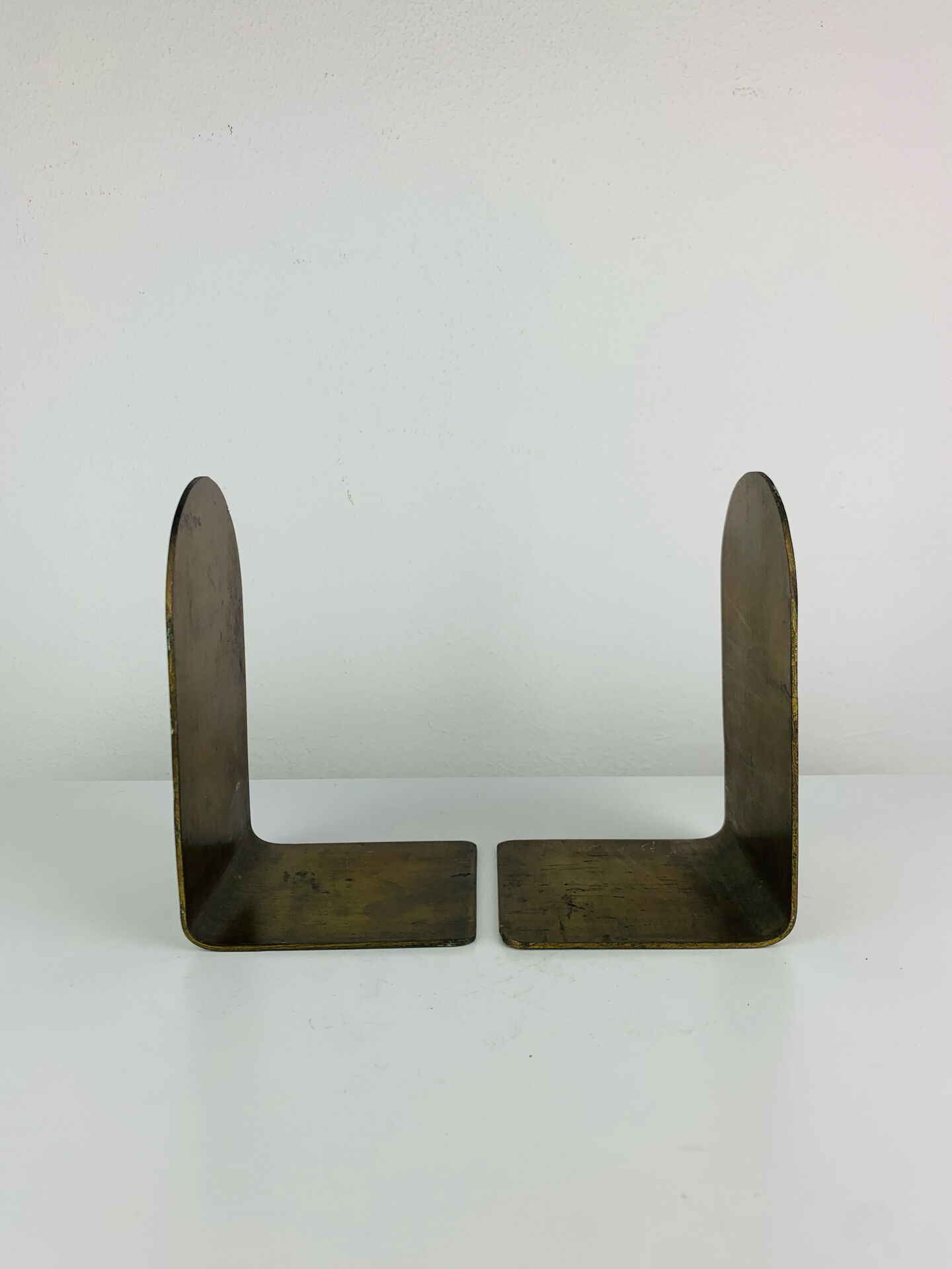 Pair of minimalist vintage raw brass bookends