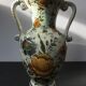 Ancient Delft vase with white ceramics decor vintage flowers