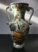 Ancient Delft vase with white ceramics decor vintage flowers