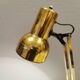 Gold coloured table lamp, Danish from Lyskaer Lighting (LB) 1980s, with black "base"