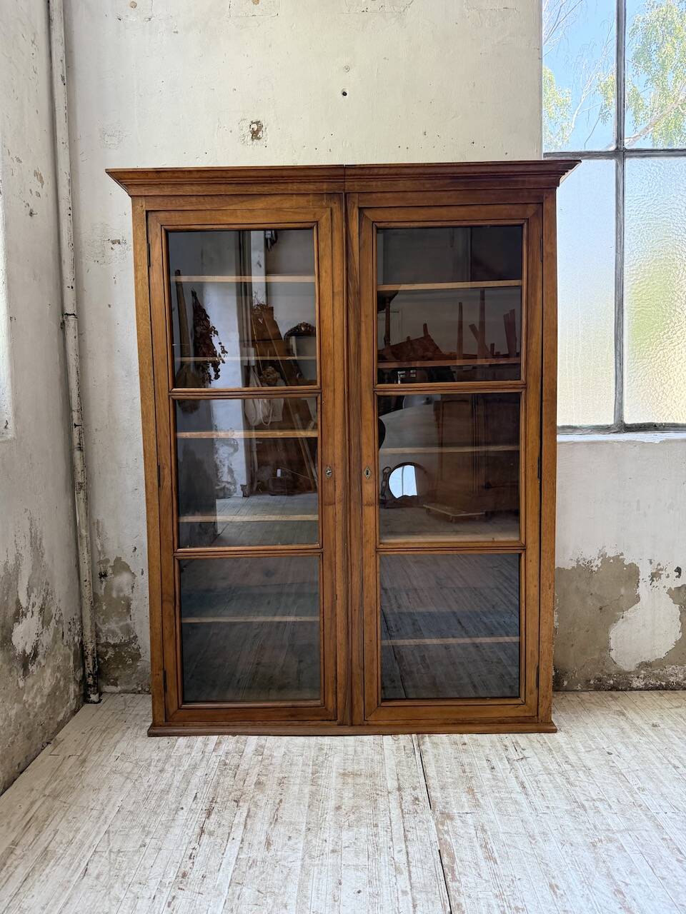 Glass-fronted walnut library 1900