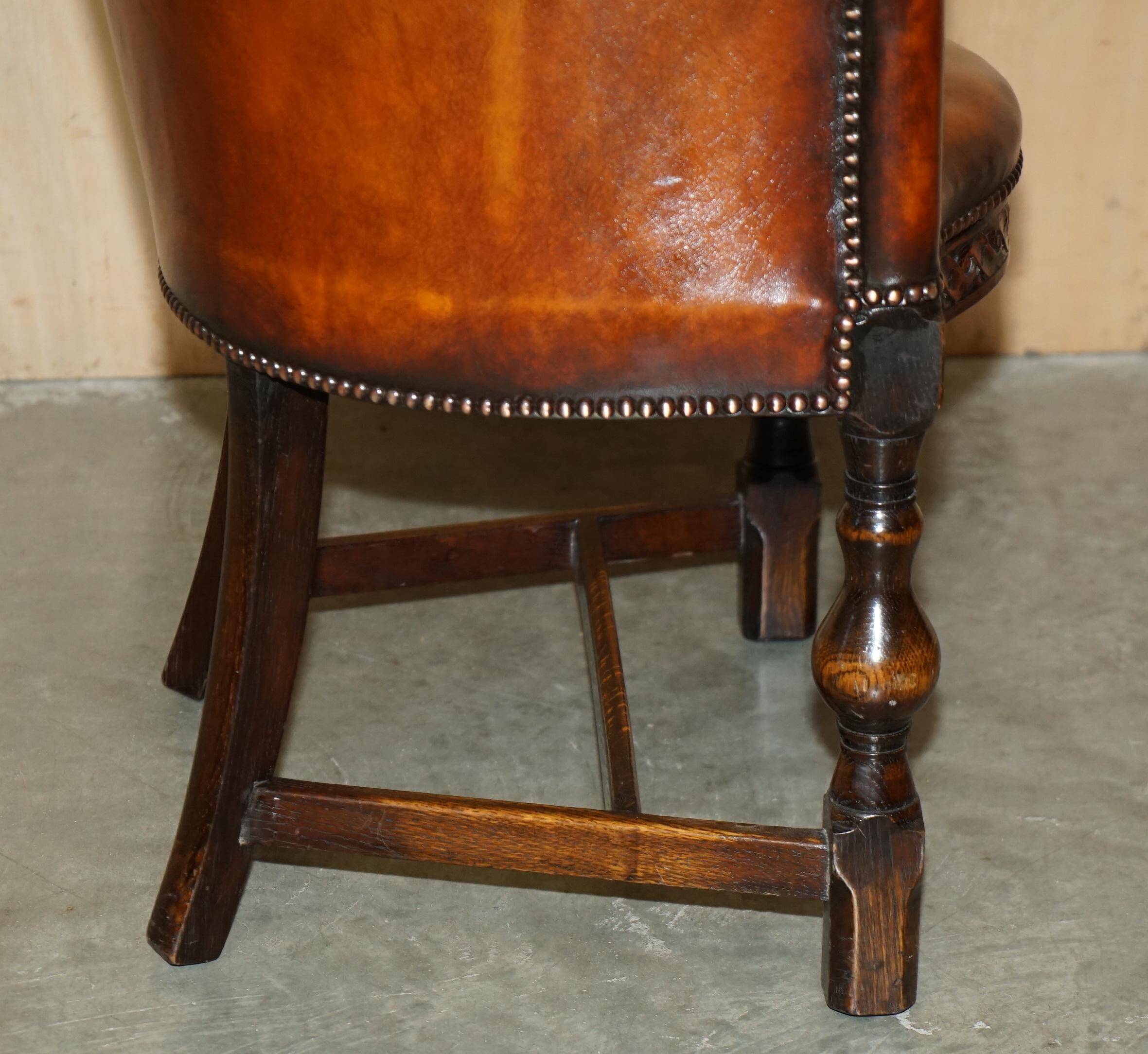 Fauteuil de bureau Édouardien 1910 en cuir et chêne sculpté