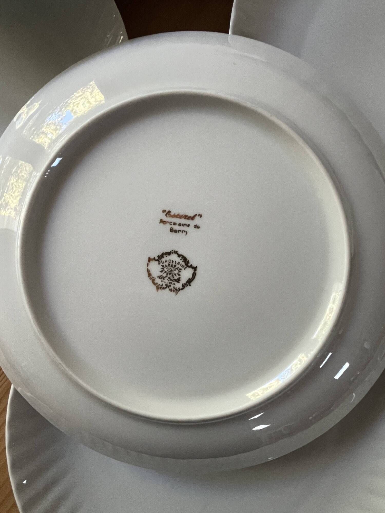 9 plates from Porcelaine du Berry