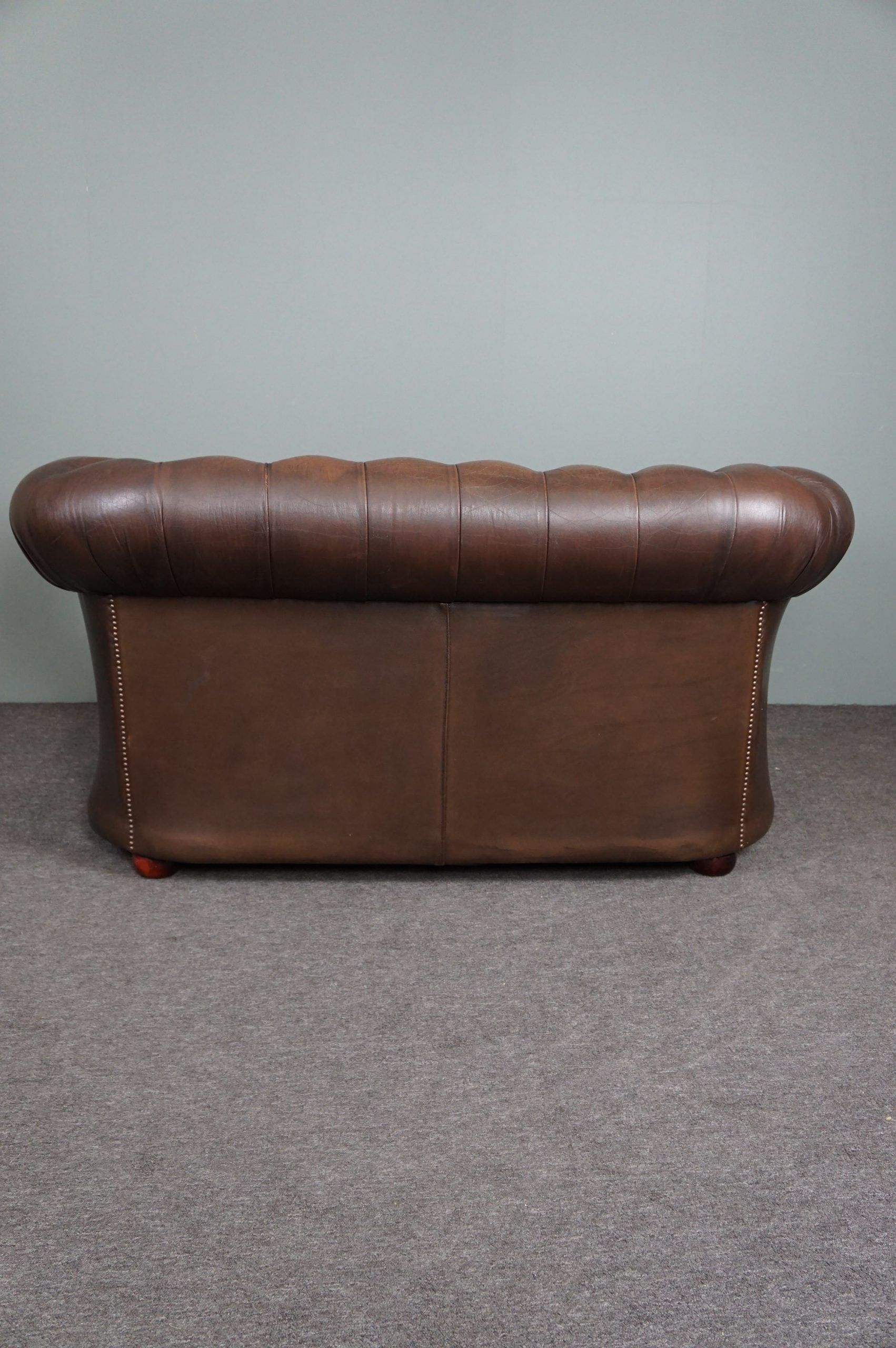 Chesterfield sofa in old cowhide 2.5 seats