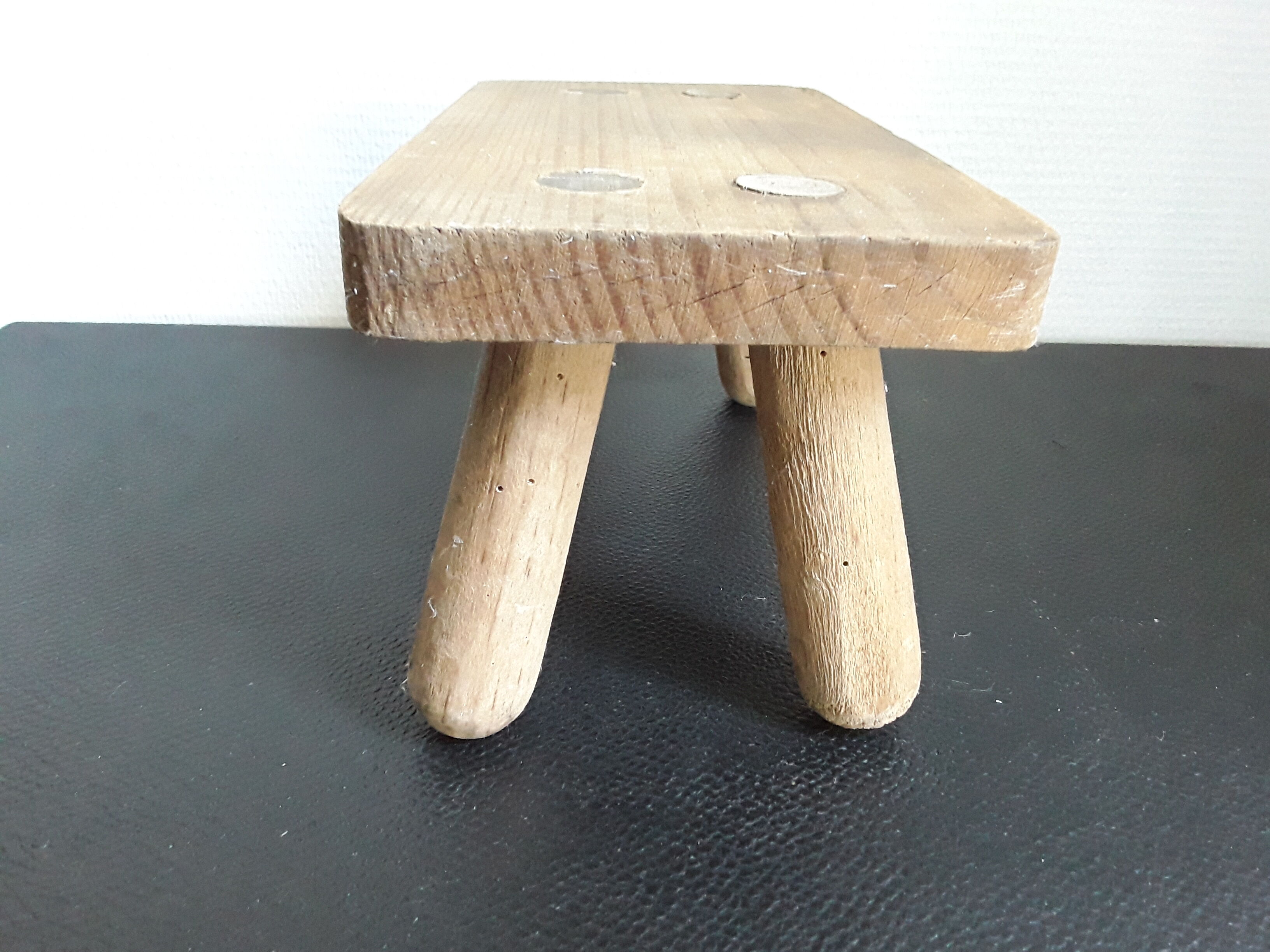 Vintage footstool in light wood