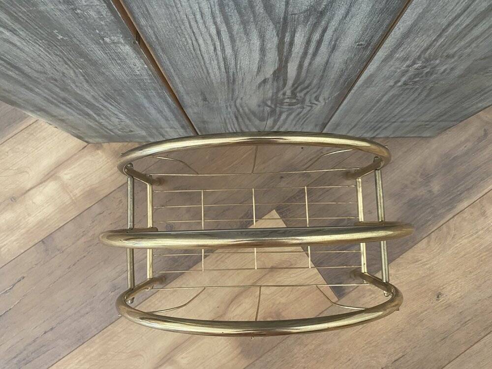 Vintage 1970s brass magazine rack, Mid-Century openwork architectural style.